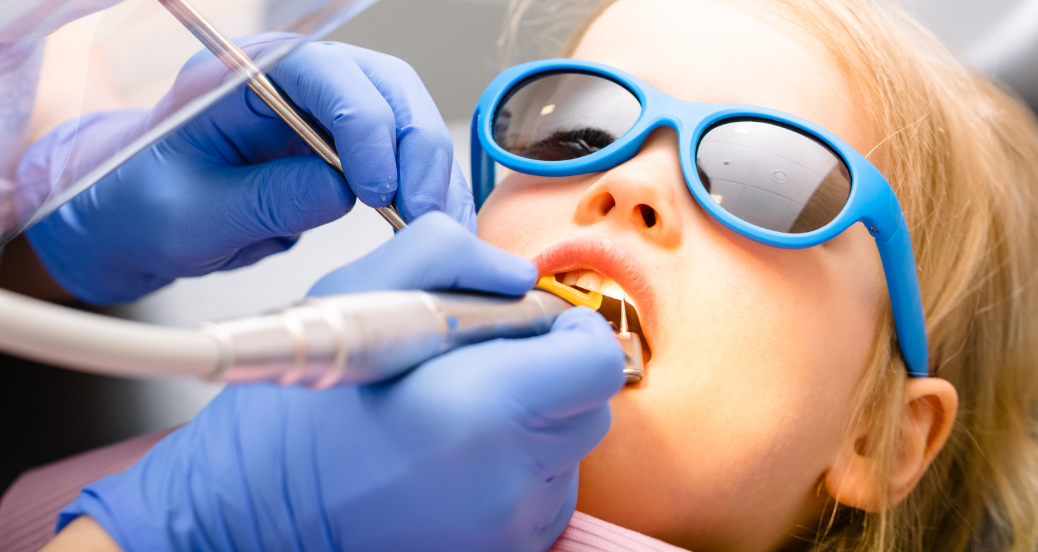 Child receiving gentle dental care